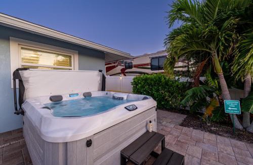 Whitney Beach Casa | Royal Palm Paradise! Waterfront, Private Pool & Hot Tub, Boat Dock!