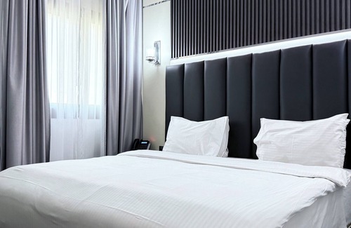 Sharjah Hotel | Royal Tulip Dancenter Suites Sharjah