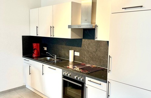 Niederemmel Apartamento | Ruhige Ferienwohnung mit Garten im Erdgeschoss