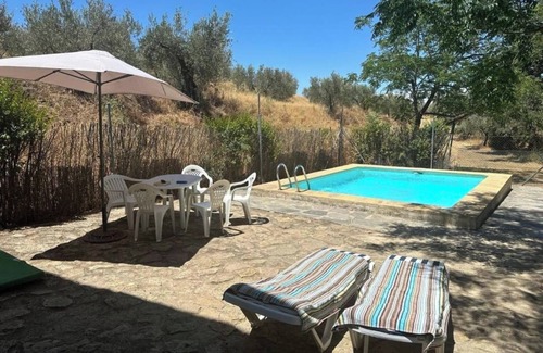 Otura Casa | Casa rural 'La Casa Del Palomar' con vistas a la montaña, piscina compartida y Wi-Fi