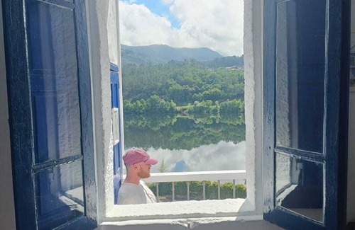 Coles Apartamento | Rustic apartment with stunning views of Rio Mino and surrounding mountains.