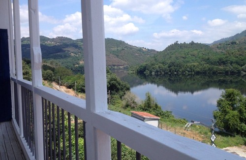 Coles Apartamento | Rustic apartment with stunning views of Rio Mino and surrounding mountains.