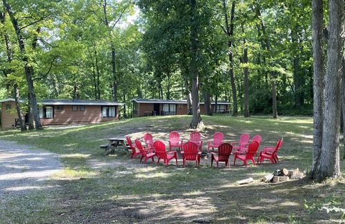 Palmyra Cabina | Rustic cabins in secluded campground with lake access and woods to wander in.