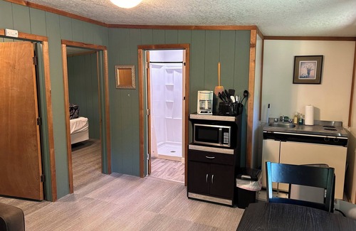 Palmyra Cabina | Rustic cabins in secluded campground with lake access and woods to wander in.