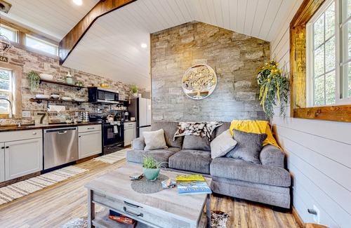 Evergreen Casa | Rustic getaway with fireplace, patio area, board games, full kitchen, & TV