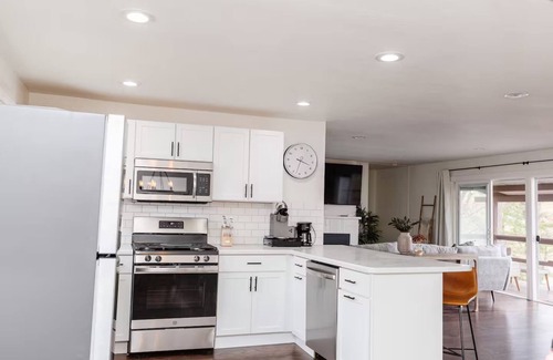 Tomahawk Casa | Rustic Lake Nokomis Cabin with Hot Tub, Trails, and Family Fun for 10!