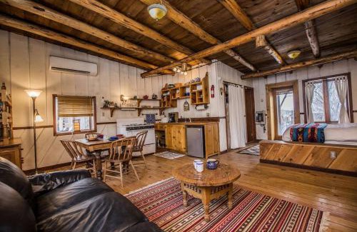 San Cristobal Casa | Rustic Log Cabin on Eco-Friendly Farm near Taos, New Mexico