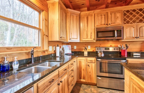 Lake Lure Cabina | Rustic mountain-view home with deck, fire pit, hot tub, fireplace, & game room