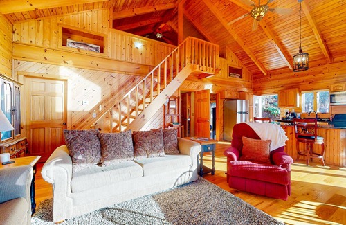 Clayton Cabina | Rustic two-story lakefront cabin near beach with dock, lake & mtn views, & deck
