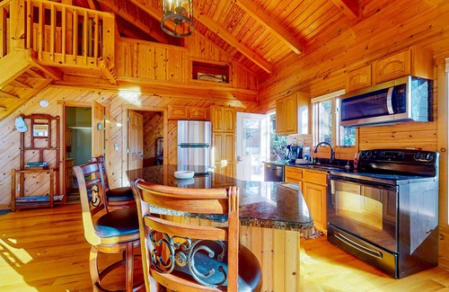 Clayton Cabina | Rustic two-story lakefront cabin near beach with dock, lake & mtn views, & deck