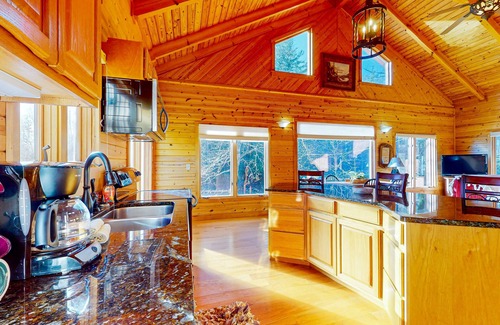 Clayton Cabina | Rustic two-story lakefront cabin near beach with dock, lake & mtn views, & deck