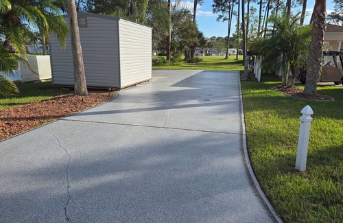 The Great Outdoors Complejo | RV Site for Rent at The Great Outdoors Resort backed up to the 14th green