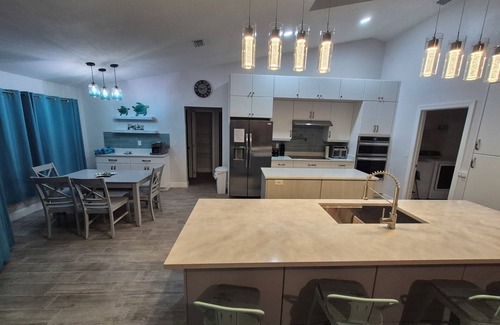 The Orchard Casa | Sadie's Daytona private pool home with 5 king beds , pool table and arcade games