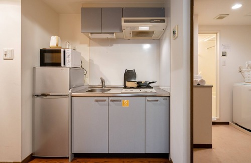 Nishi Apartamento | Sakura Sands Hotel