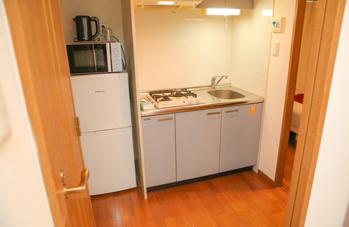 Nishi Apartamento | Sakura Sands Hotel