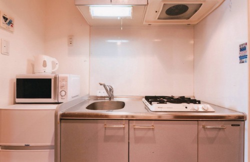 Nishi Apartamento | Sakura Sands Hotel