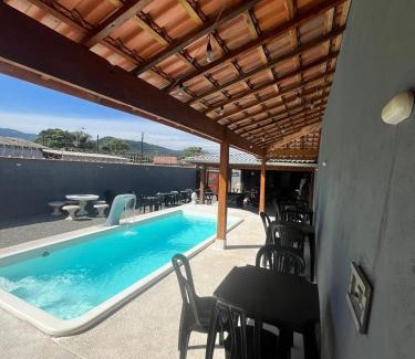 Melvi Casa | Salão para festas com piscina, bairro Jardim Melvi em Praia Grande - Salve Jorge