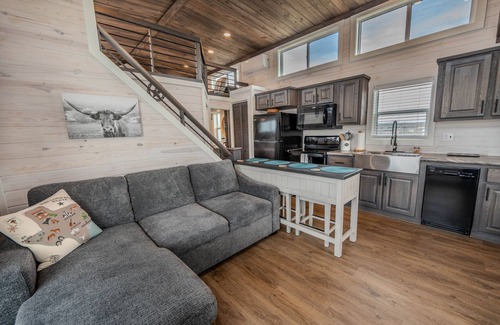 Fredericksburg Cabaña | Pet-Friendly 'Salento Tiny Haus' Features Dual Porches, Solo Stove Fire Pit, and Multi-Purpose Dinin