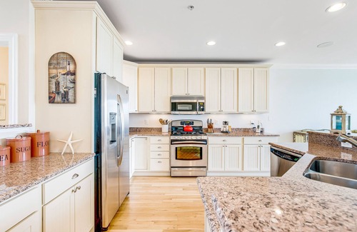 Fenwick Island Casa | Salt Meadows townhouse w/ elevator, gas grill & community pool and pier