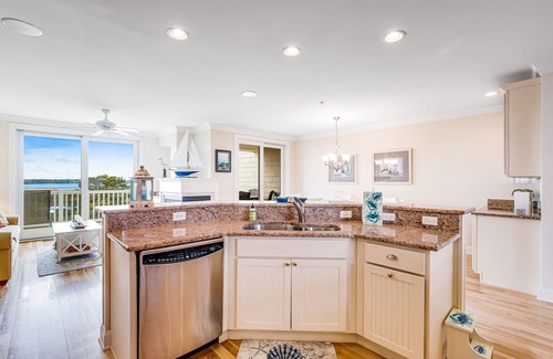 Fenwick Island Casa | Salt Meadows townhouse w/ elevator, gas grill & community pool and pier