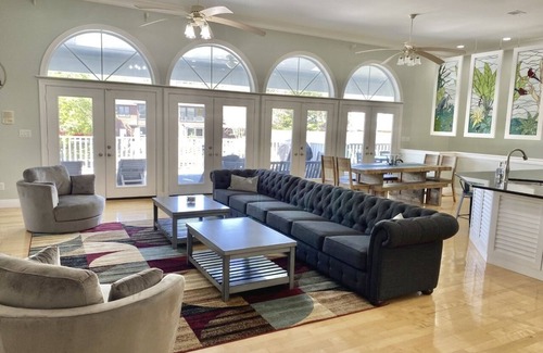 Gulf Breeze Casa | Salty Pelican Retreat on Canal with Pool, Elevator and Boat Dock