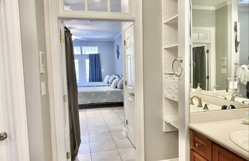 Gulf Breeze Casa | Salty Pelican Retreat on Canal with Pool, Elevator and Boat Dock