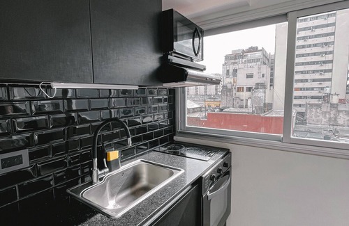 San Telmo Apartamento | San Telmo: moderno PH con terraza privada y parrilla