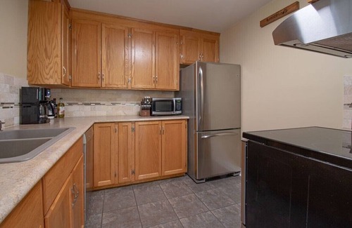 Kearney Cabaña | Sand Lake Getaway - Modern Riverfront Cottage w/ Swimming & Hot Tub