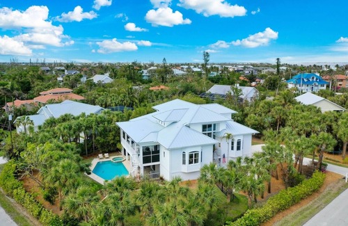 Shell Harbor Casa | Sanibel 6 bedroom Luxury Home with Pool,One Block from Beach,Pier and Canal View
