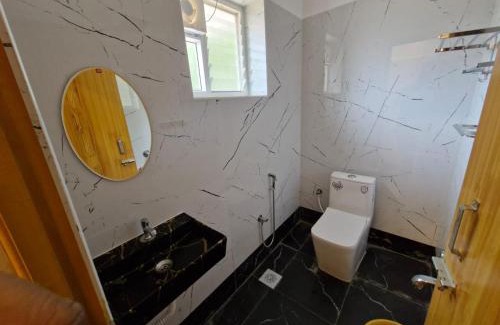 Courtallam Apartamento | Saraa Grand