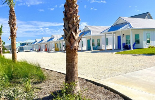 Port St. Joe Cabaña | "Scallop Cottage" is a pet friendly, 2 bed, 1 1/2 bath unit accepting 5 guests. Pool Coming 2025!