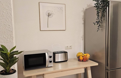Buderich Apartamento | Scandi Studio with balcony I 15 min Düsseldorf fair & airport