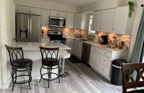 Elizabethtown Casa | School Village Walk-in shower and jetted tub