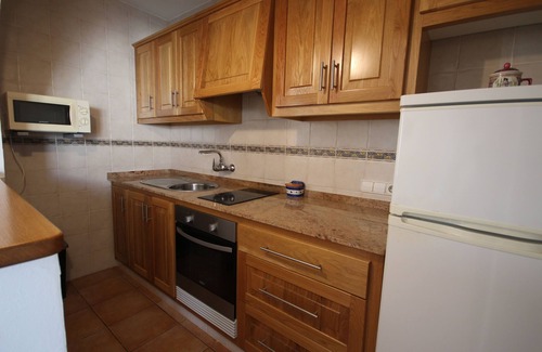 Cap d'Artrutx Casa | Bungalow frente al mar con 2 dormitorios y 2 baños. Wi-Fi gratis.