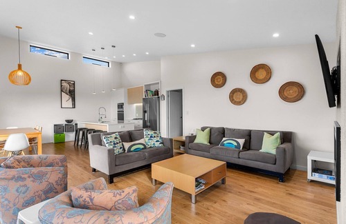 Langs Beach Casa | Sea Spray - Large modern, sunny holiday home with expansive decks and stunning views over Bream Bay