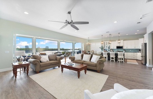 Bonita Springs Casa | Seafoam Serenity - Bayfront Retreat w/Dock, Pool & 1 Min Walk to Bonita Beach