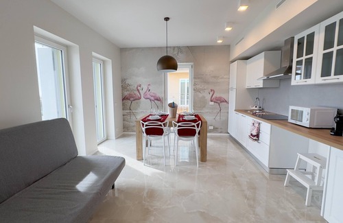 Chioggia Apartamento | Seafront Modern Flamingo Suite by Ca-sa Check