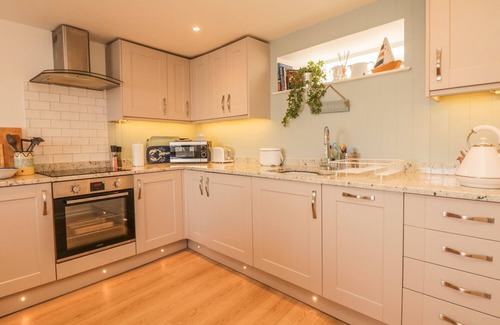 Exmouth Cabaña | SEARLES, admite mascotas, con un jardín en Lympstone, Ref 980889