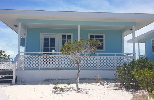 Black Point Cabaña | Seashell Cottage cerca de cerdos de natación