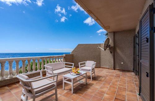 Arico Apartamento | Seaside Apartment with Spacious Terrace, Pool, and Wi-Fi