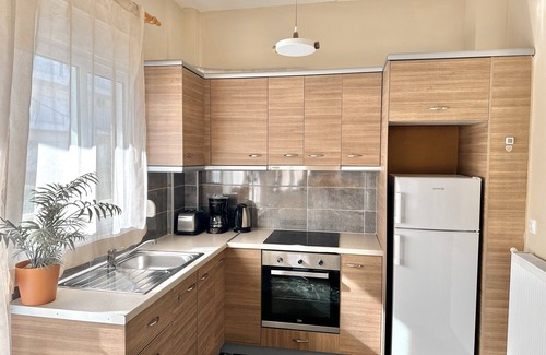 Olymbiaki Akti Apartamento | Seaside Family Home with Wraparound Balcony & 2 Baths - Blue Zone Homes