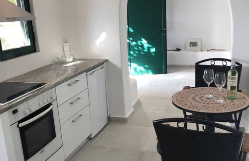 Pefki Apartamento | Apartamento con vistas al mar, piscina infinita y cocina