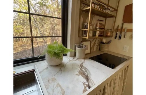 Readyville Cabaña | secluded cottage- firepit, outdoor shower, hammock