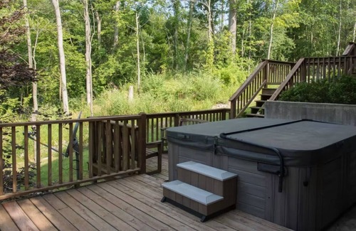 Fennville Casa | Secluded dog-friendly cabin on 10 acres - hot tub & game room!