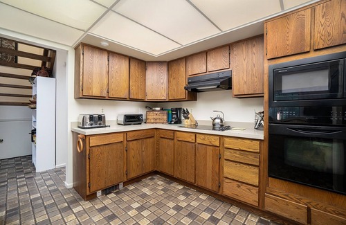 Maple City Cabaña | Secluded home with three kitchens, vaulted ceilings, washer/dryer, & patios