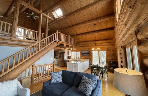 Lake Leelanau Cabina | Secluded Log Cabin Retreat on 11 Wooded Acres with Hot Tub & Lake Michigan Views