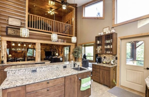 Catalpa Cabina | Secluded log cabin home located on 13 acres with salt water pool & jacuzzi.