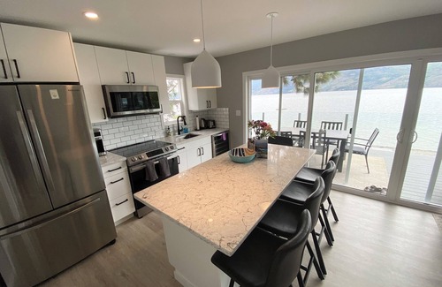 Central Okanagan Cabina | Seclusion Bay, Luxury Lakeside Cabin 9. Stunning beachfront on Okanagan Lake.