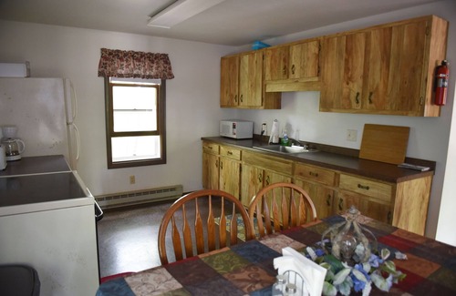 Rhinelander Cabina | Aislamiento, agua y arena esperan a su familia.