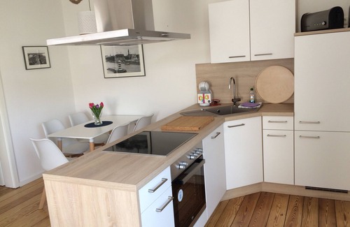 Warnemuende Apartamento | "Seelenstreichler" - 58 metros cuadrados con terraza soleada y chimenea de madera - Centro